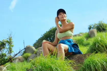 Hiker Woman looking up with enjoy calm breathing fresh air