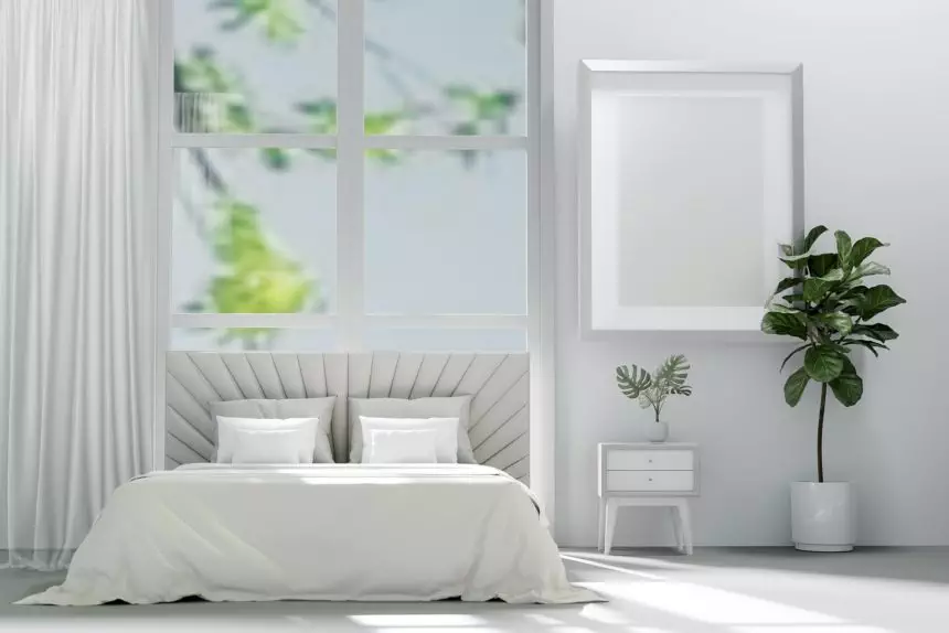 Bed in the bedroom in a Scandinavian minimalist style. Light pillows on the bed. 3D Render
